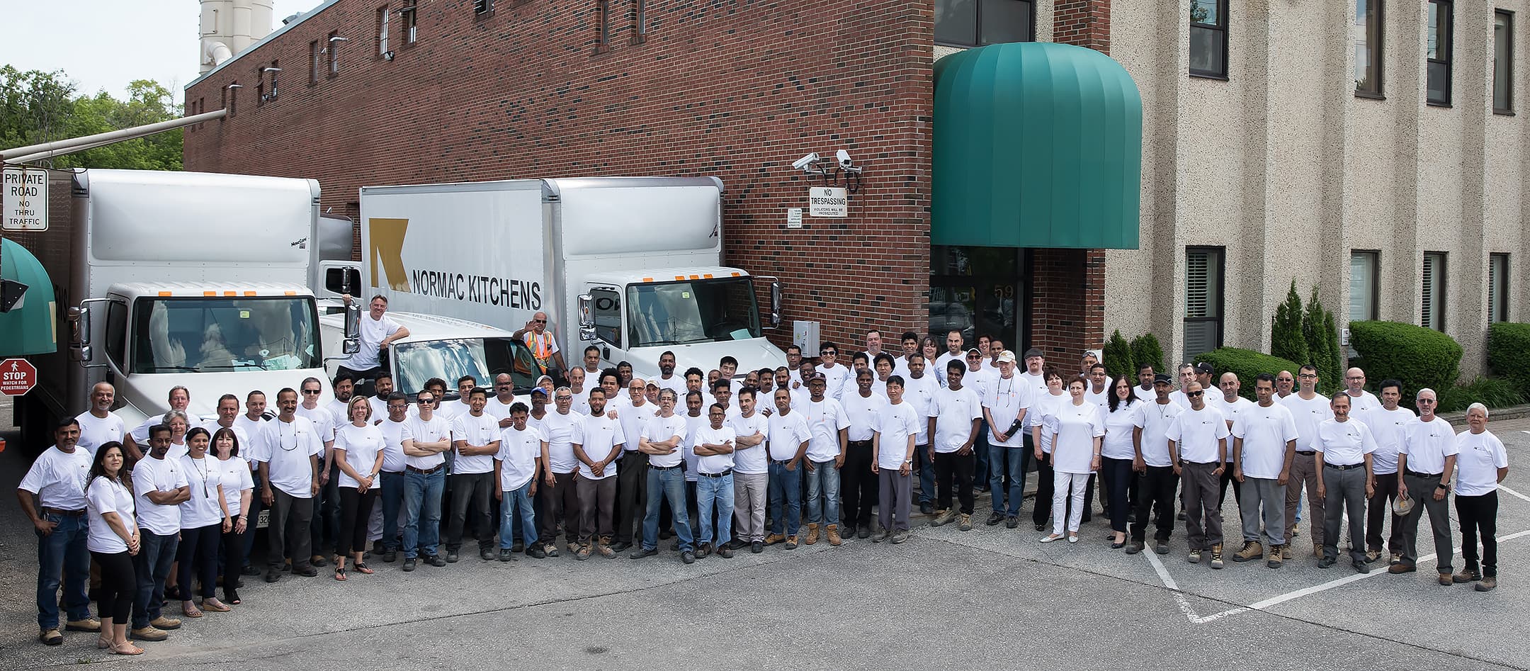 group photo of Normac employees outside head office
